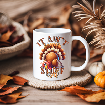 a white coffee mug with a turkey on it