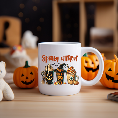 a white coffee mug sitting on top of a wooden table