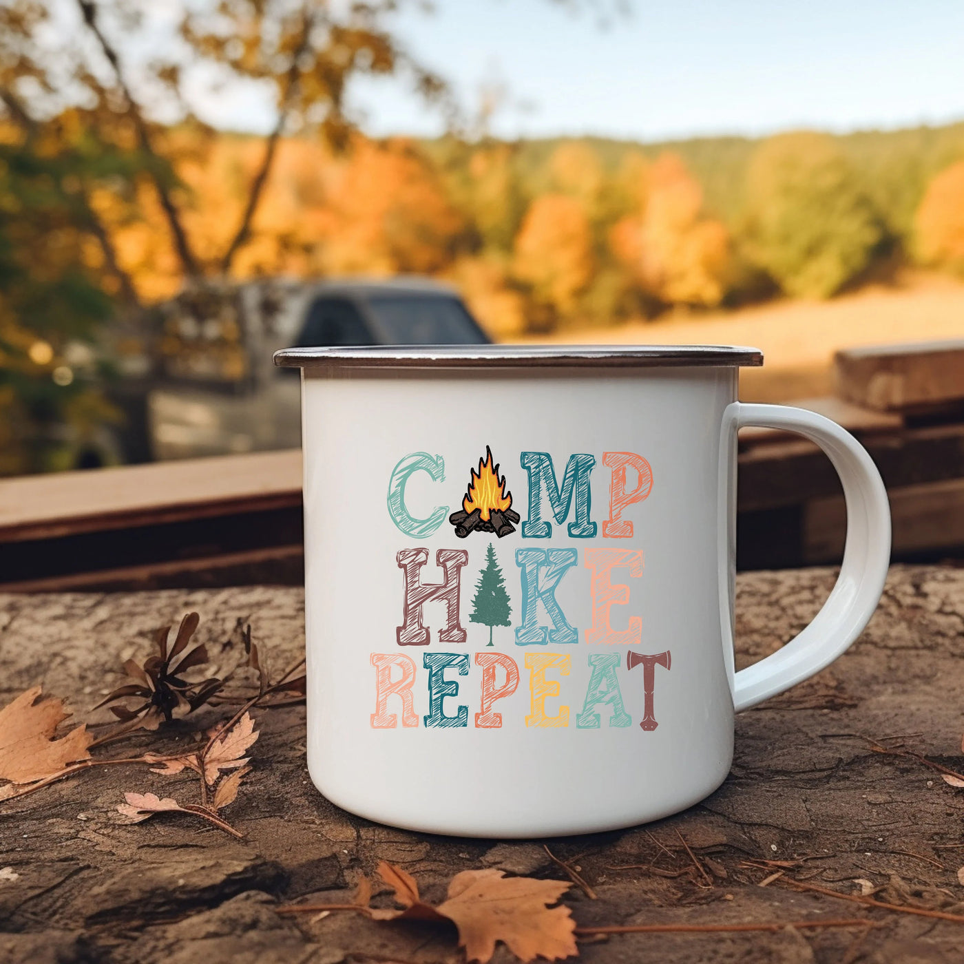 a camp hike mug sitting on the ground