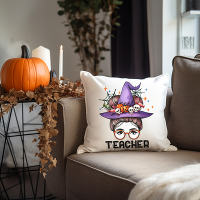 a pillow that has a witch on it