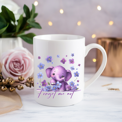 a coffee mug with a picture of an elephant on it