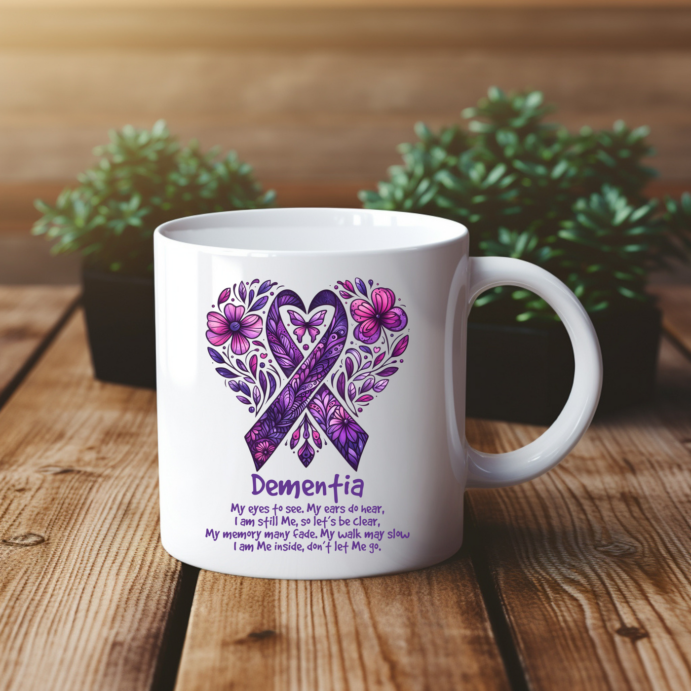 a white coffee mug with a purple ribbon on it