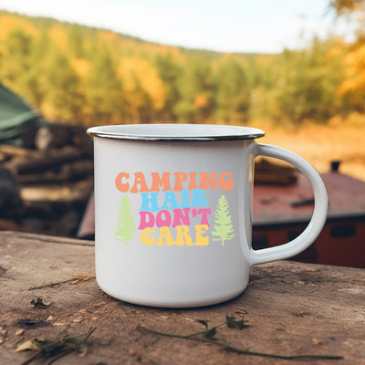 a camper mug sitting on top of a wooden table