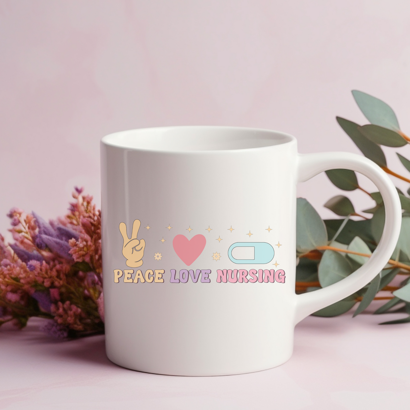 a white coffee mug with peace love nursing on it