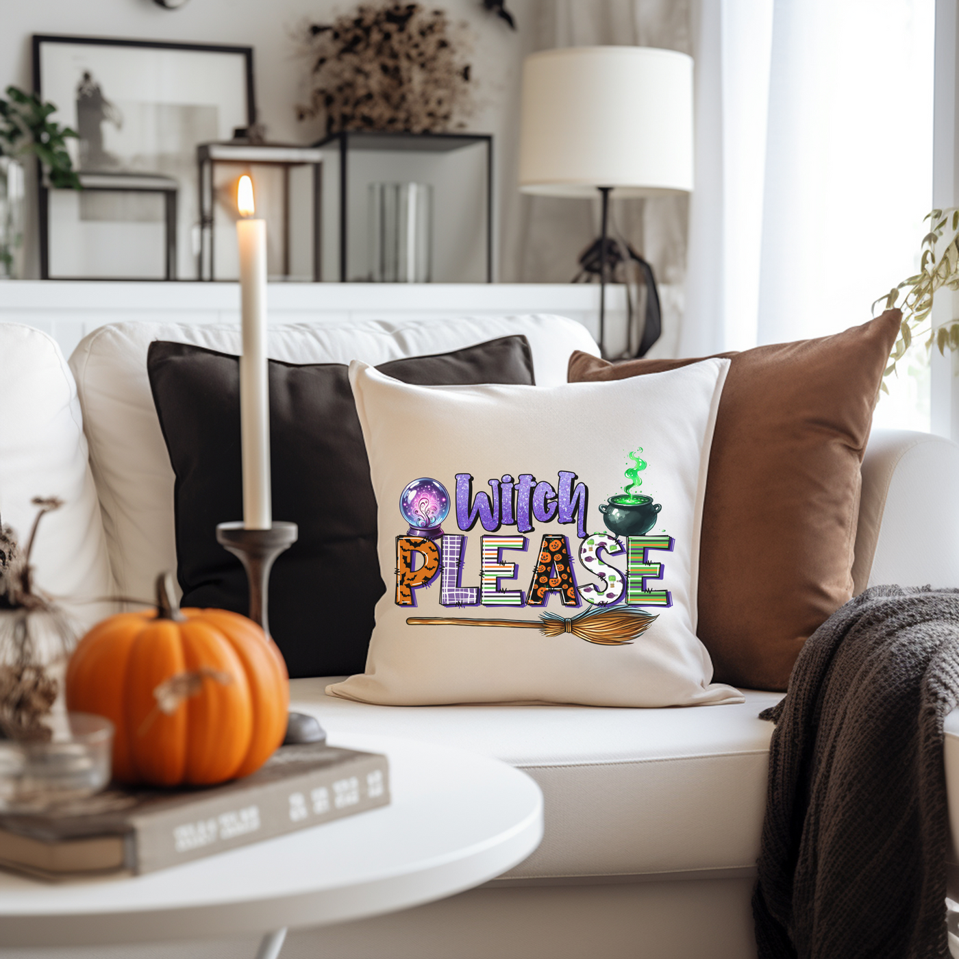 a living room with a white couch and a white coffee table