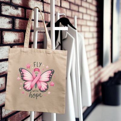 a pink bag hanging on a brick wall