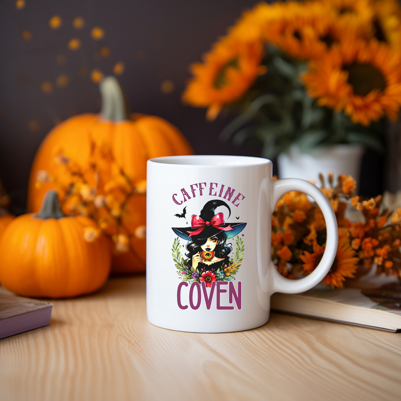 a coffee mug with the words caffeine coven on it