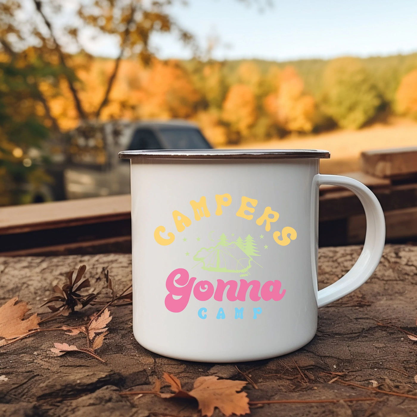 a camper's coffee mug sitting on the ground