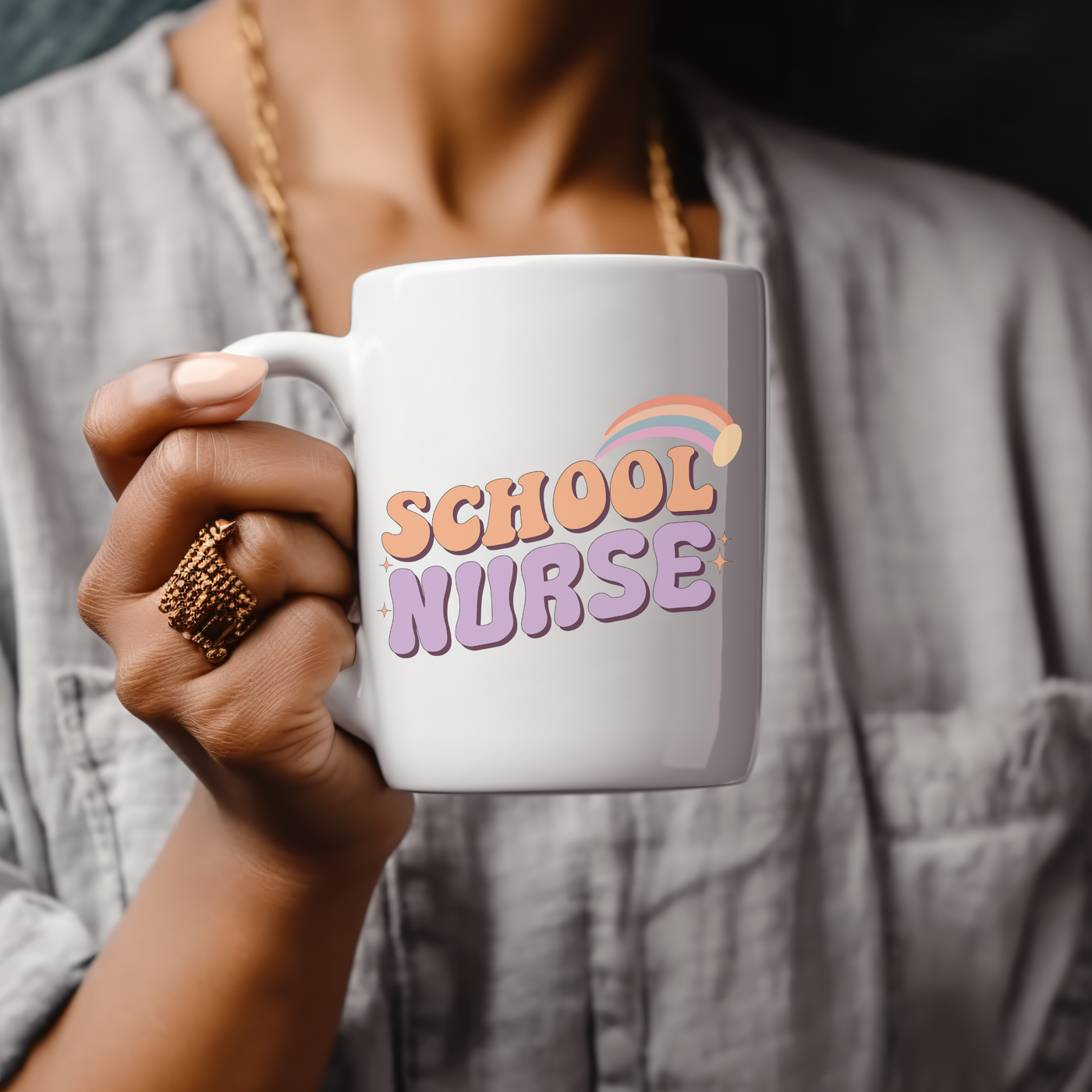 a close up of a person holding a coffee mug