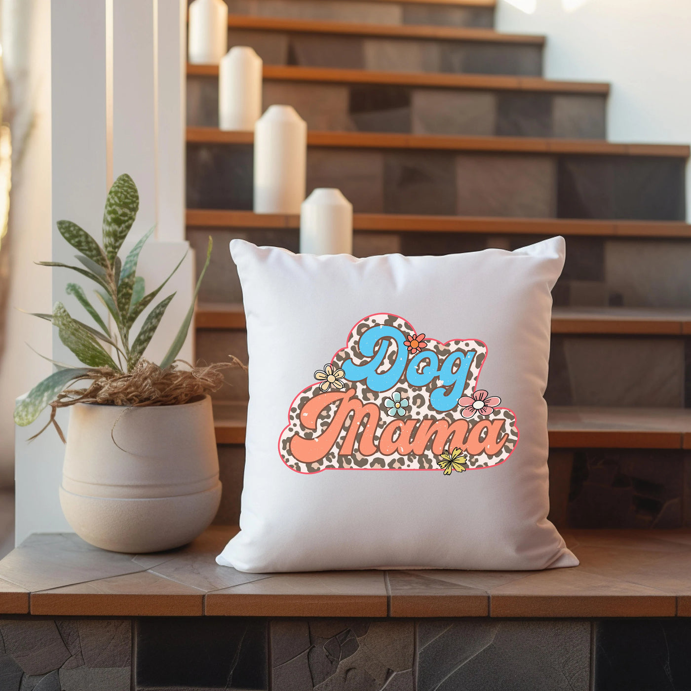 a white pillow sitting on top of a wooden table