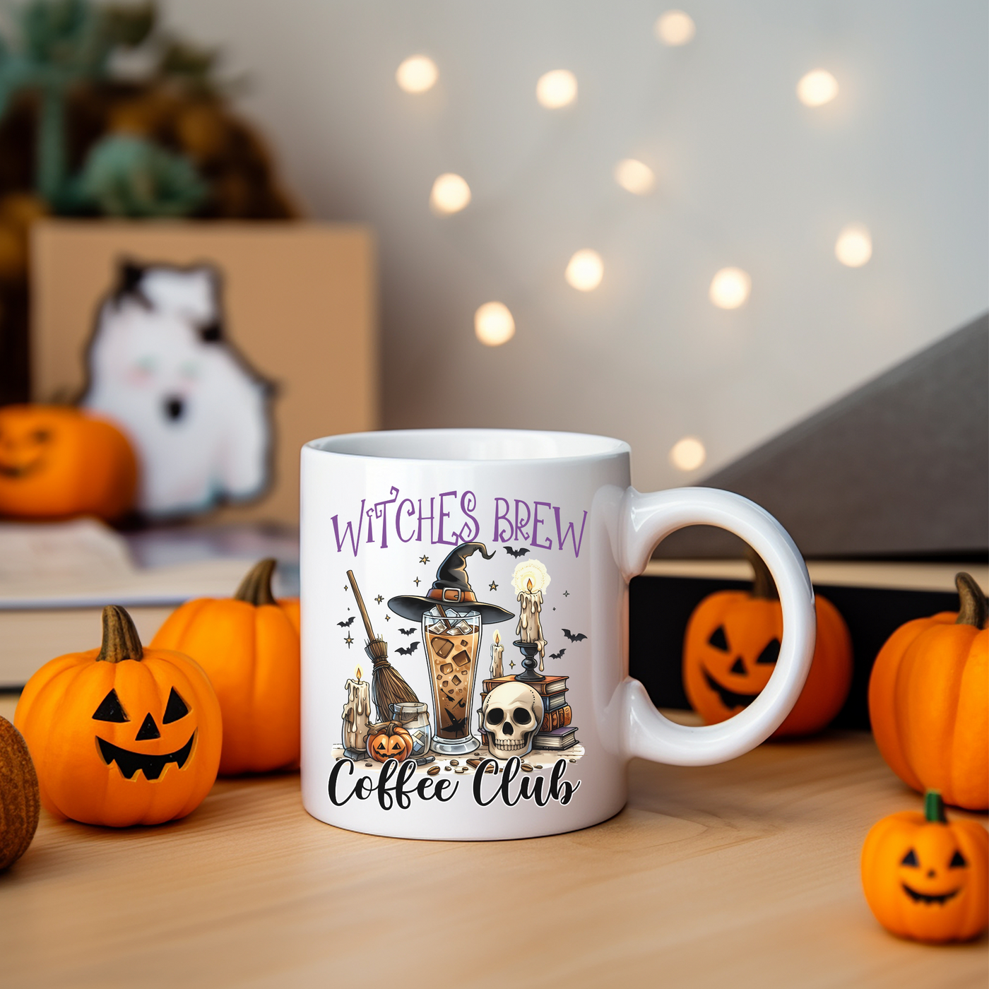 a white coffee mug with witches brew on it