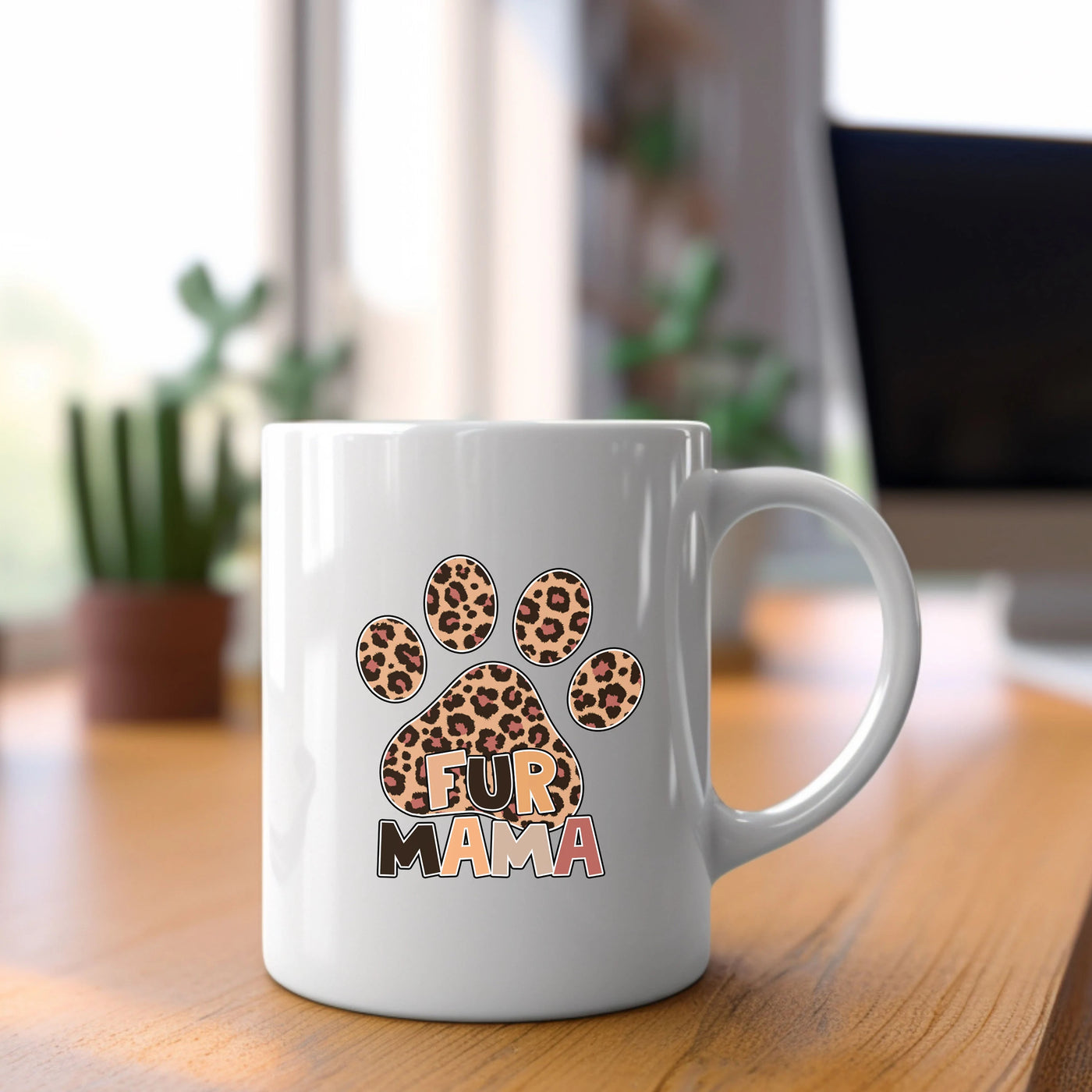 a white coffee mug with a leopard print on it