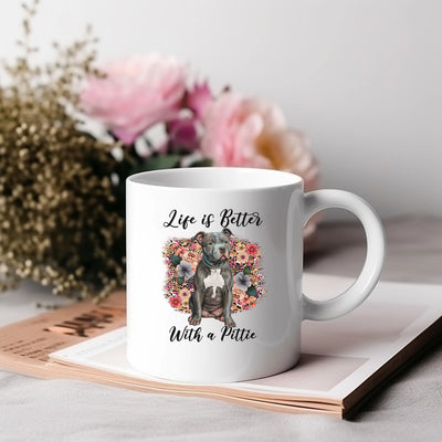 a white coffee mug with a dog on it