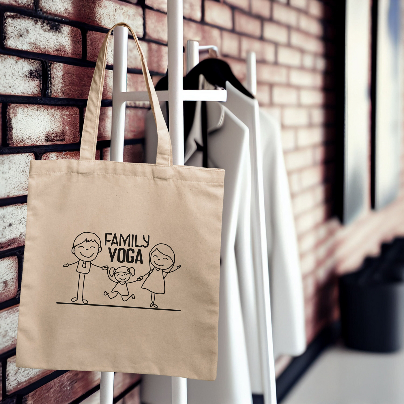 a tote bag hanging on a brick wall