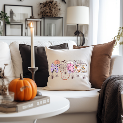 a living room with a white couch and a white coffee table