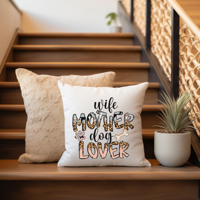 a white pillow sitting on top of a wooden banister